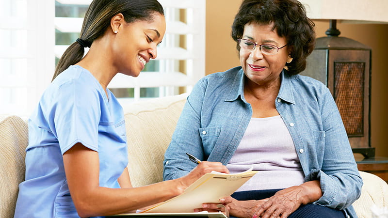 young nurse with senior patient young nurse with senior patient